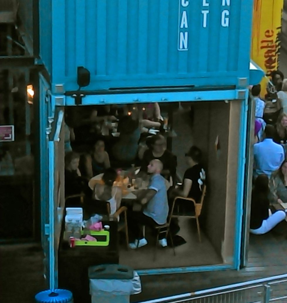 A pop-up diner using an empty shipping container.  South Bank, London